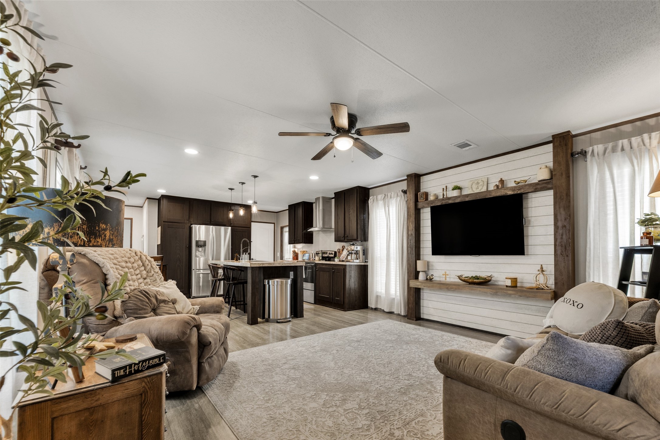 3133 Henderson Road Navasota, TX 77868 - Photo 14 of 26 a living room with furniture and a flat screen tv
