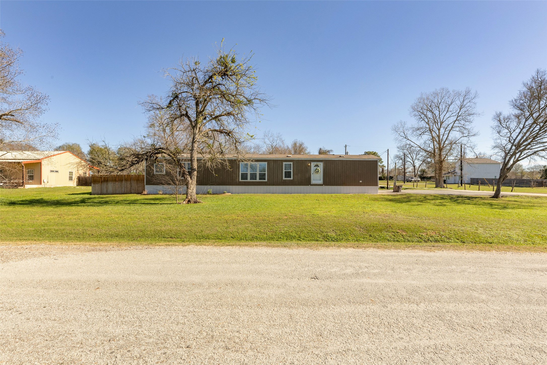 3133 Henderson Road Navasota, TX 77868 - Photo 2 of 26 a view of swimming pool and trees in the background
