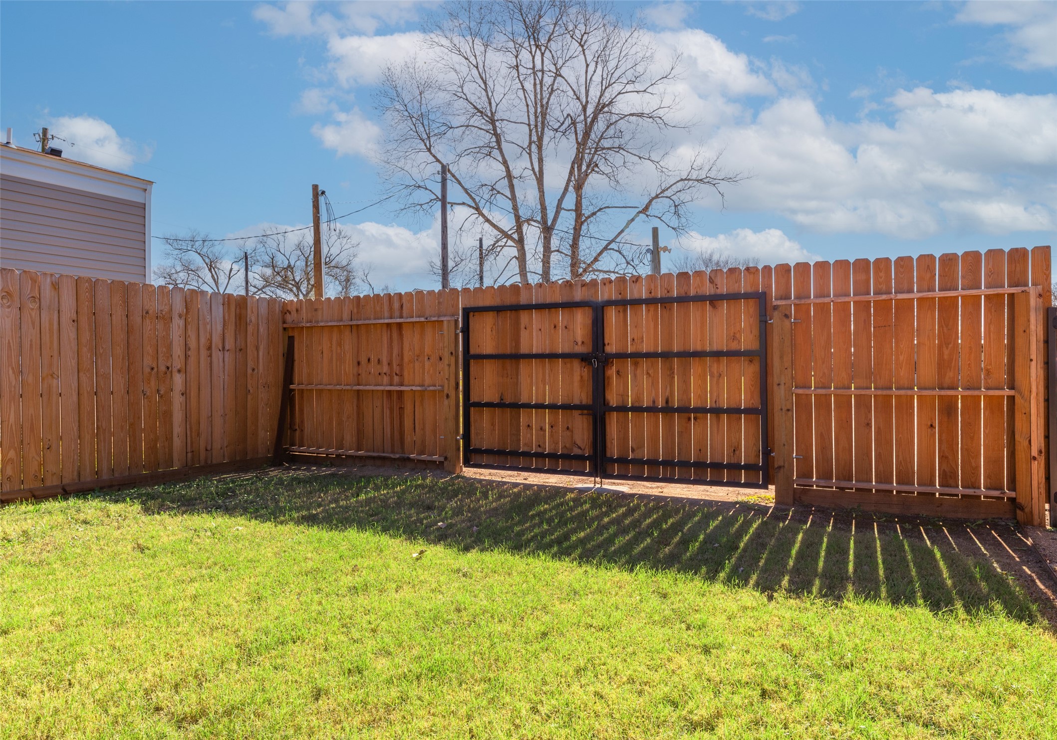 3133 Henderson Road Navasota, TX 77868 - Photo 26 of 26 a view of backyard with wooden fence