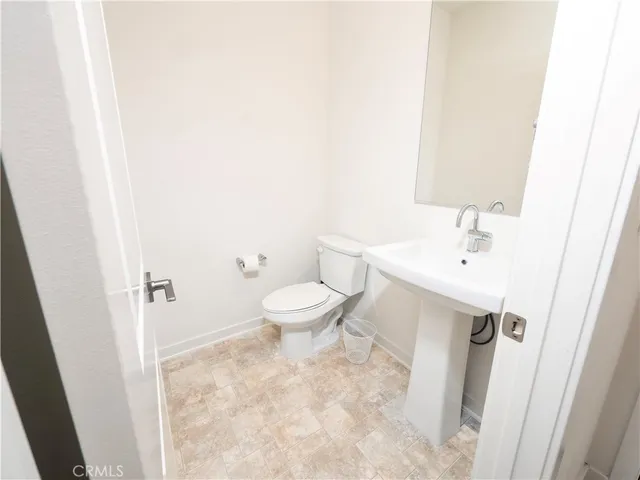a bathroom with a sink and a toilet