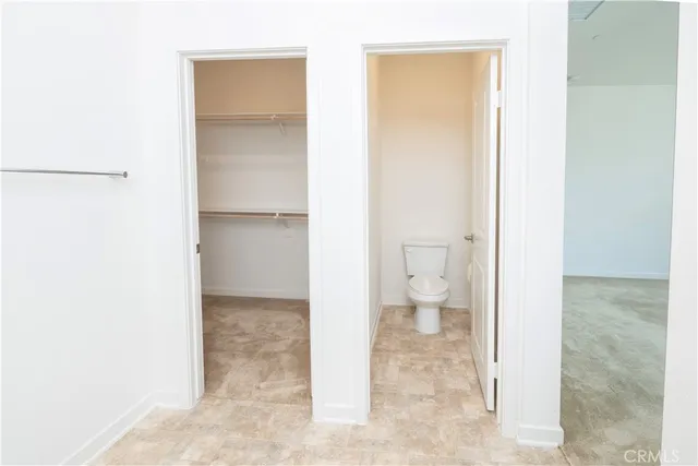 a view of bathroom with a toilet