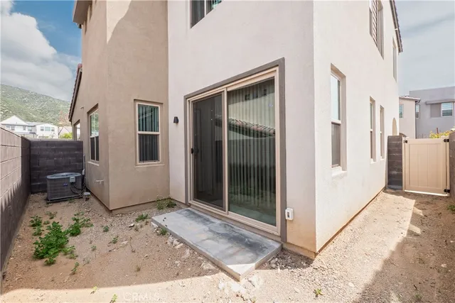 a view of a front door and wooden floor