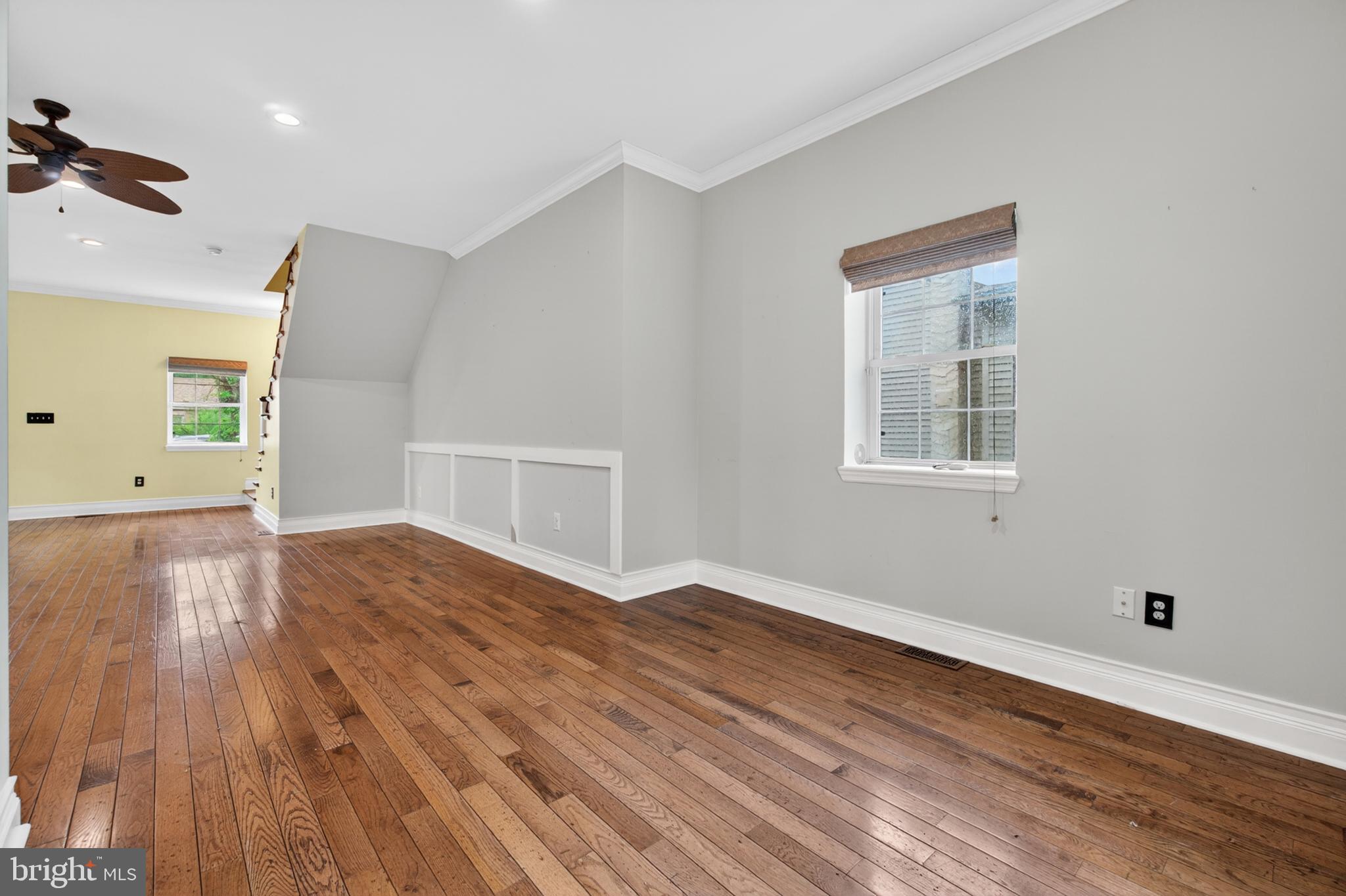 117 State Avenue Lindenwold, NJ 08021 - Photo 14 of 58 a view of empty room with wooden floor and fan