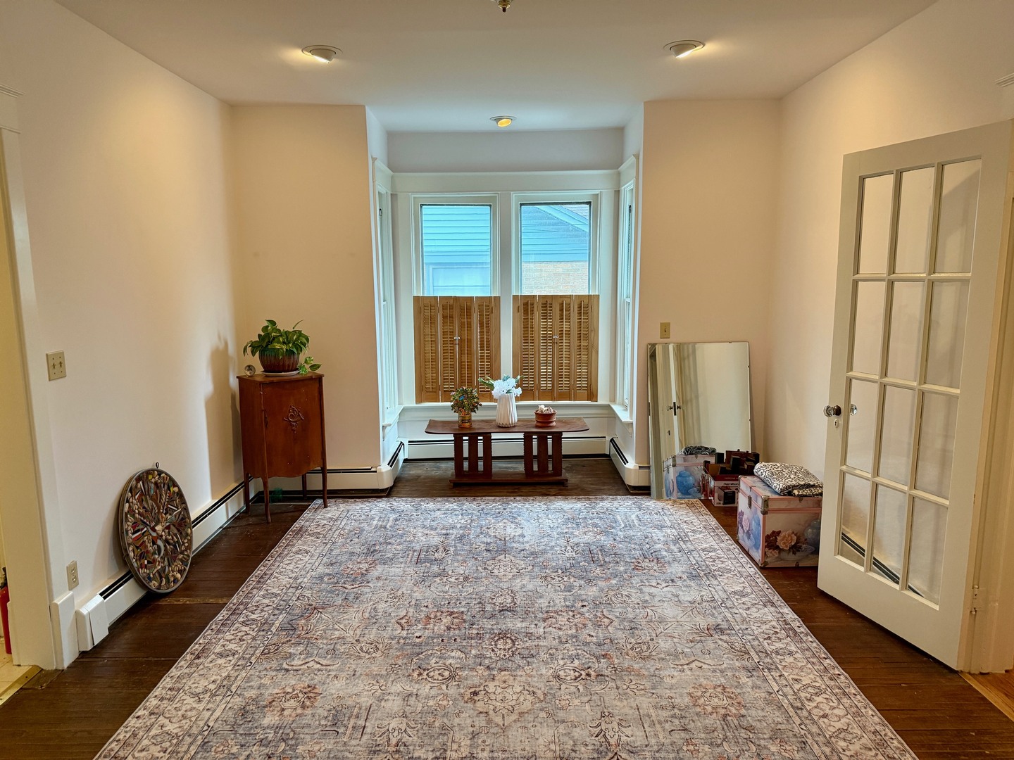 742 South 4th Street DeKalb, IL 60115 - Photo 9 of 46 a living room with furniture rug and a large window