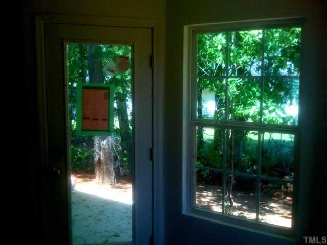 1101 Lombar Street Raleigh, NC 27610 - Photo 2 of 4 a room view with a lake view