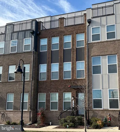 a front view of a building with a street