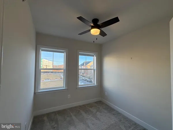 a view of a balcony with car parked