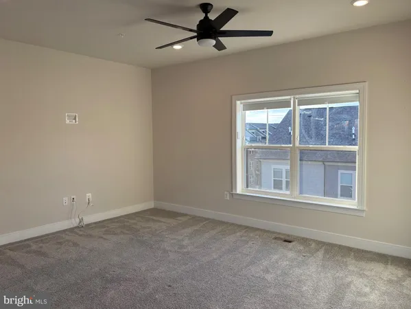 a view of balcony with furniture