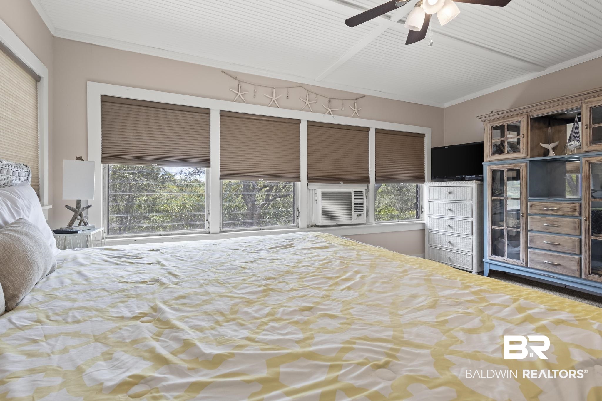 562 Veterans Road Gulf Shores, AL 36542 - Photo 18 of 32 Bedroom with cooling unit and ceiling fan