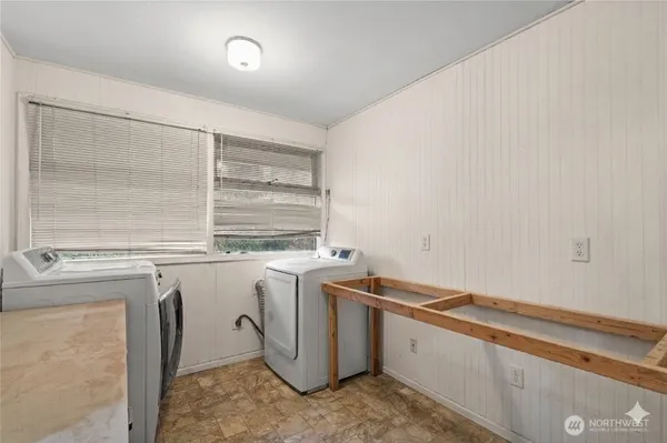 a view of a chair and tables