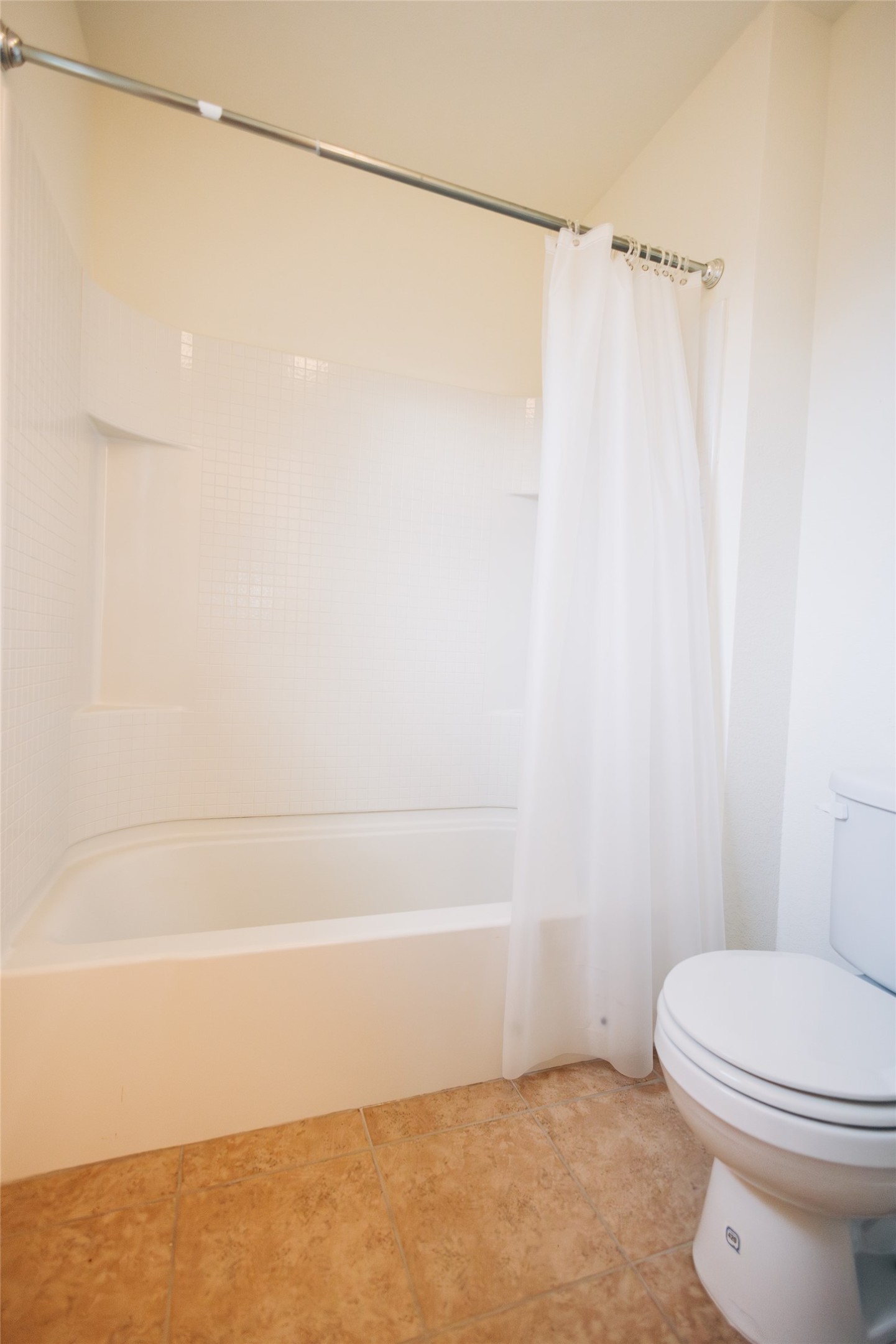 2905 Acopio Bend Austin, TX 78745 - Photo 17 of 29 Full bathroom featuring shower / tub combo and light tile patterned flooring
