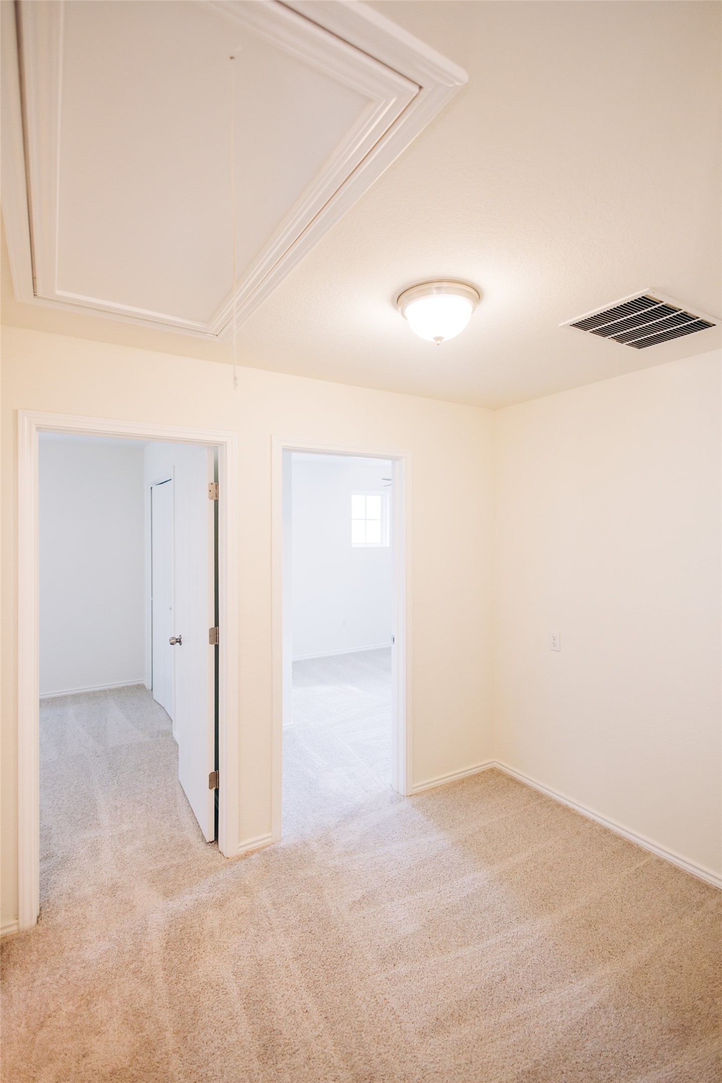 2905 Acopio Bend Austin, TX 78745 - Photo 18 of 29 Empty room with attic access and light carpet