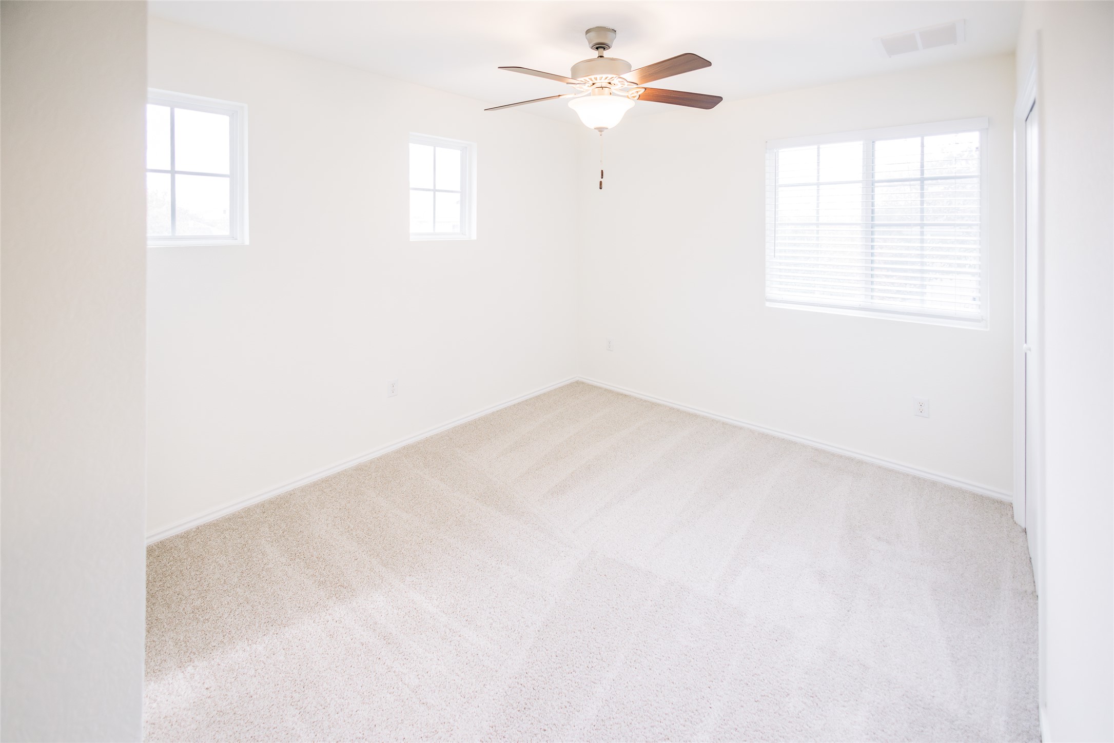 2905 Acopio Bend Austin, TX 78745 - Photo 22 of 29 Unfurnished room with carpet flooring and ceiling fan