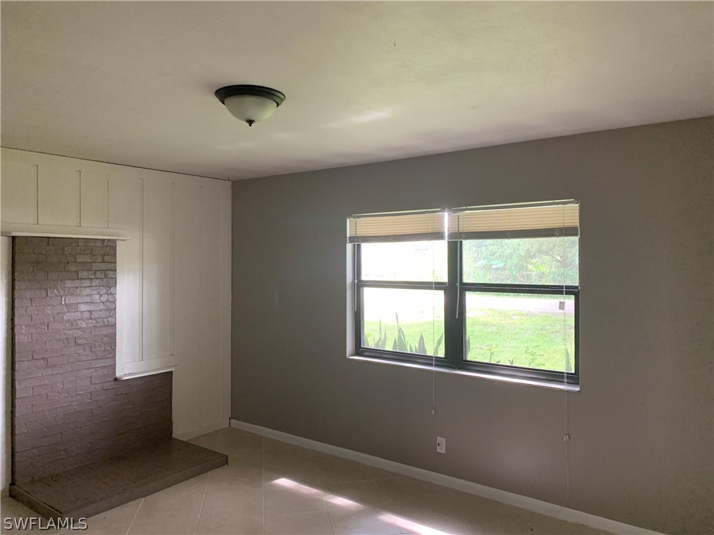 2819 W Road Fort Myers, FL 33905 - Photo 11 of 12 an empty room with windows