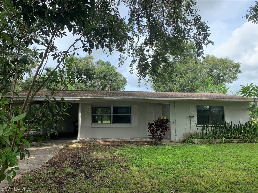 2819 W Road Fort Myers, FL 33905 - Photo 2 of 12 a view of a house with backyard