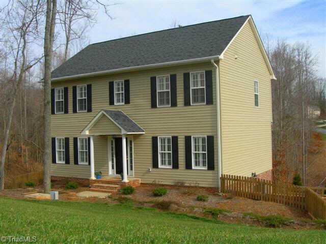 8124 Chestershire Road Oak Ridge, NC 27310 - Photo 1 of 9 Exterior Front.