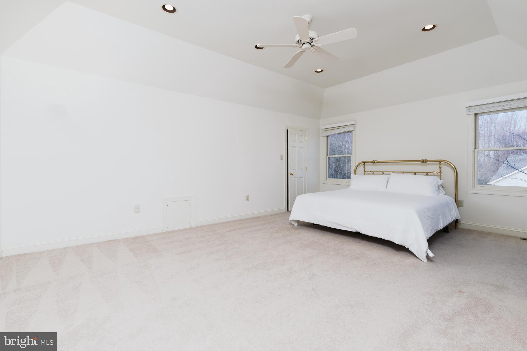 9 Corbin Drive Exton, PA 19341 - Photo 16 of 30 a bedroom with a bed and a night stand