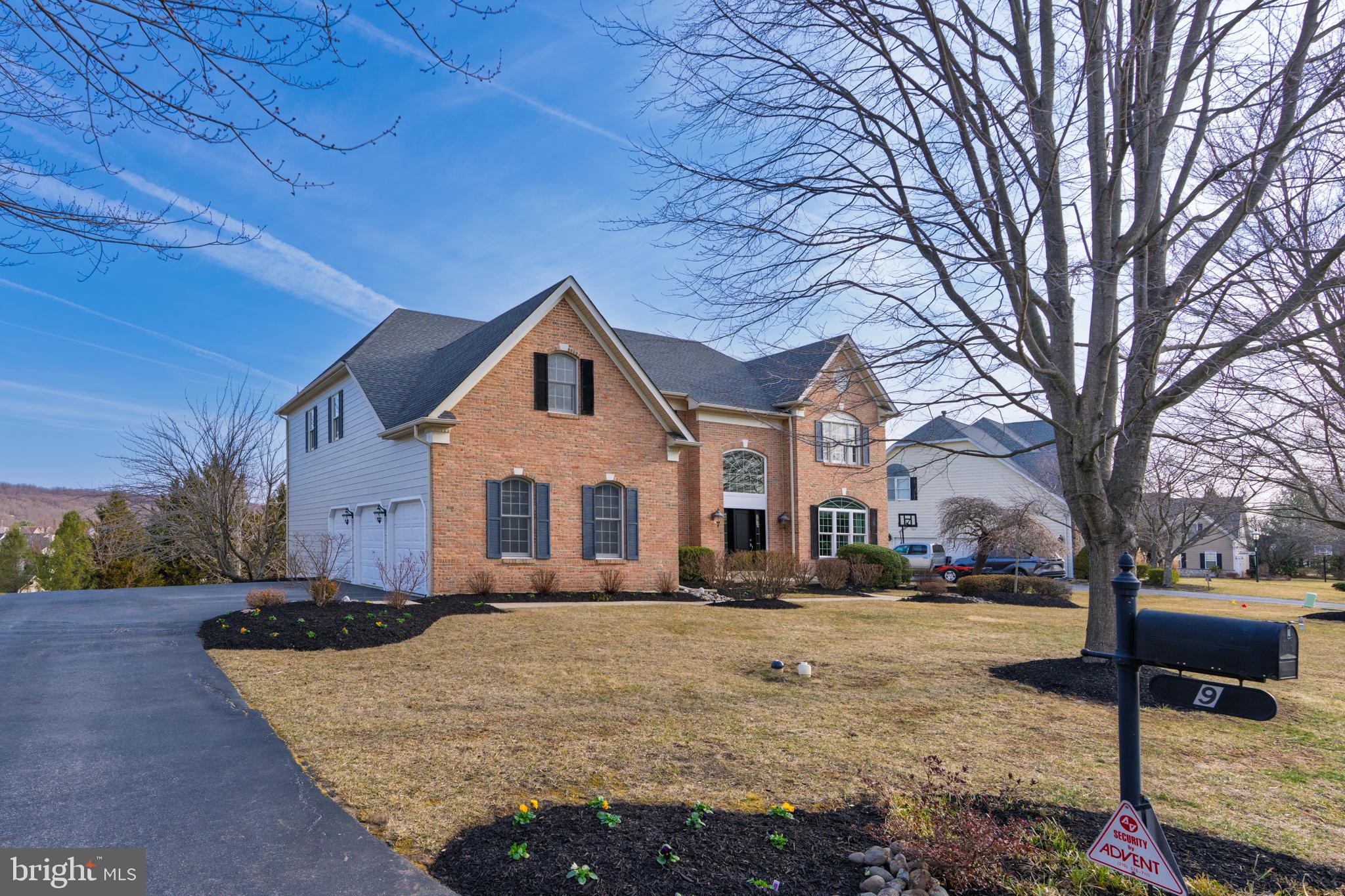 9 Corbin Drive Exton, PA 19341 - Photo 29 of 30 a front view of a house with a yard