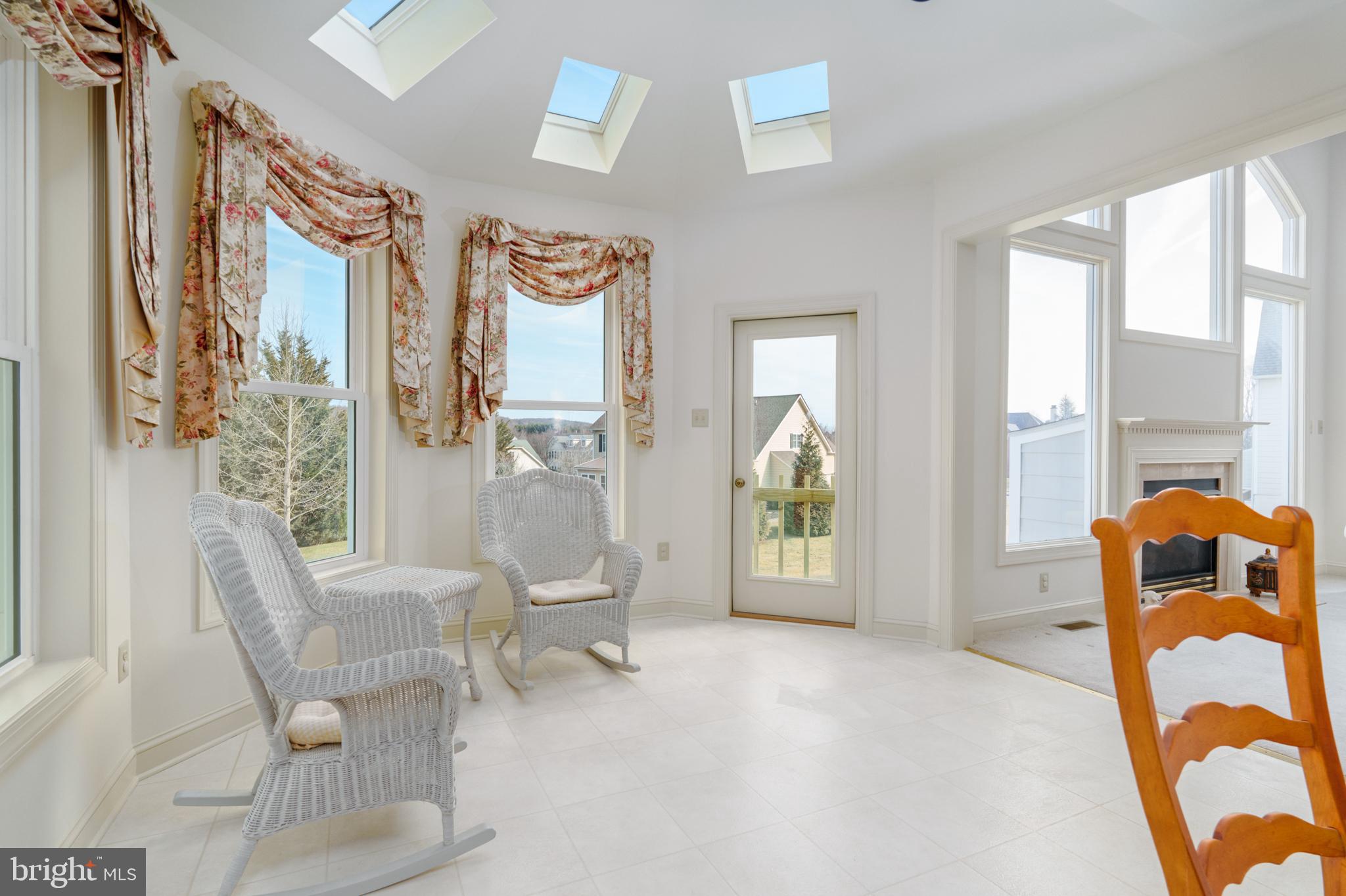 9 Corbin Drive Exton, PA 19341 - Photo 9 of 30 a living room with furniture and a large window