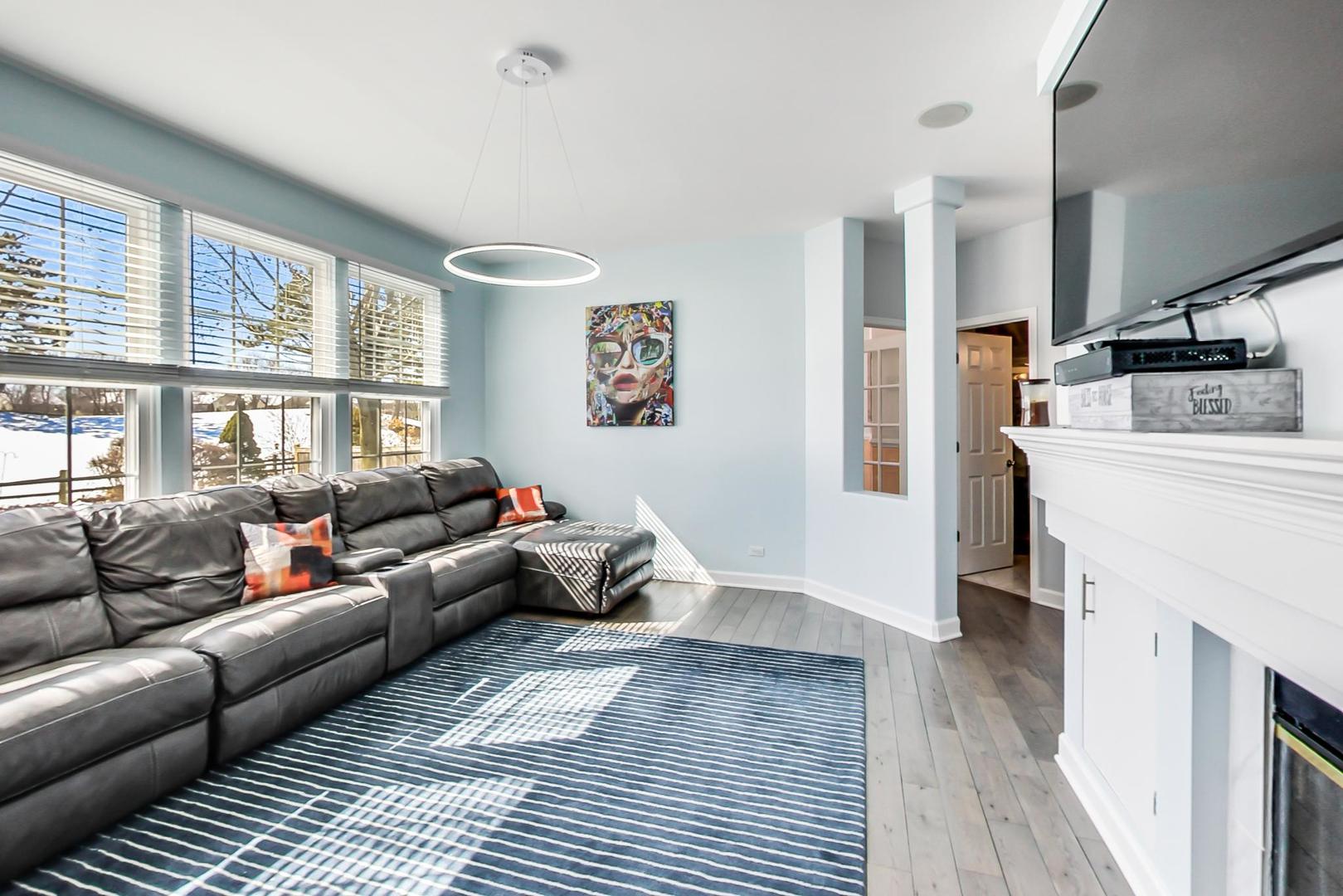 7311 Dada Drive Gurnee, IL 60031 - Photo 15 of 51 a living room with furniture and a fireplace
