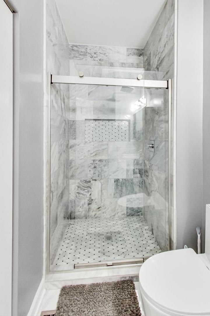 7311 Dada Drive Gurnee, IL 60031 - Photo 19 of 51 a bathroom with a shower