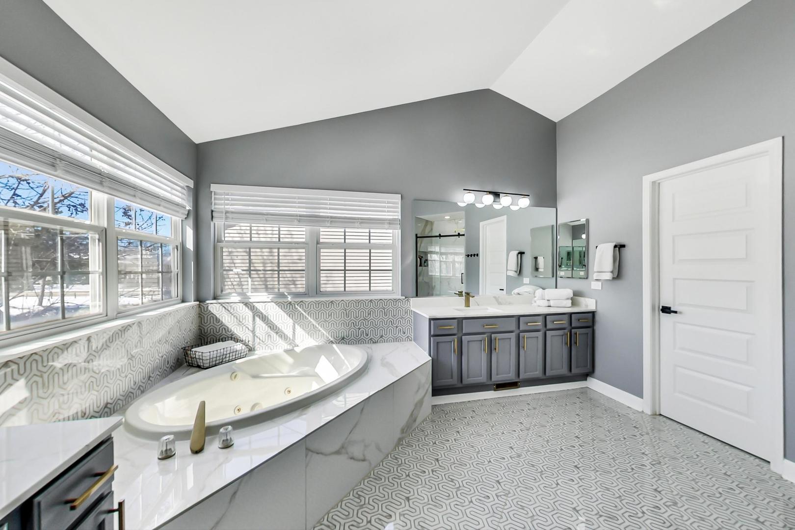 7311 Dada Drive Gurnee, IL 60031 - Photo 28 of 51 a living room with kitchen island granite countertop furniture and fireplace