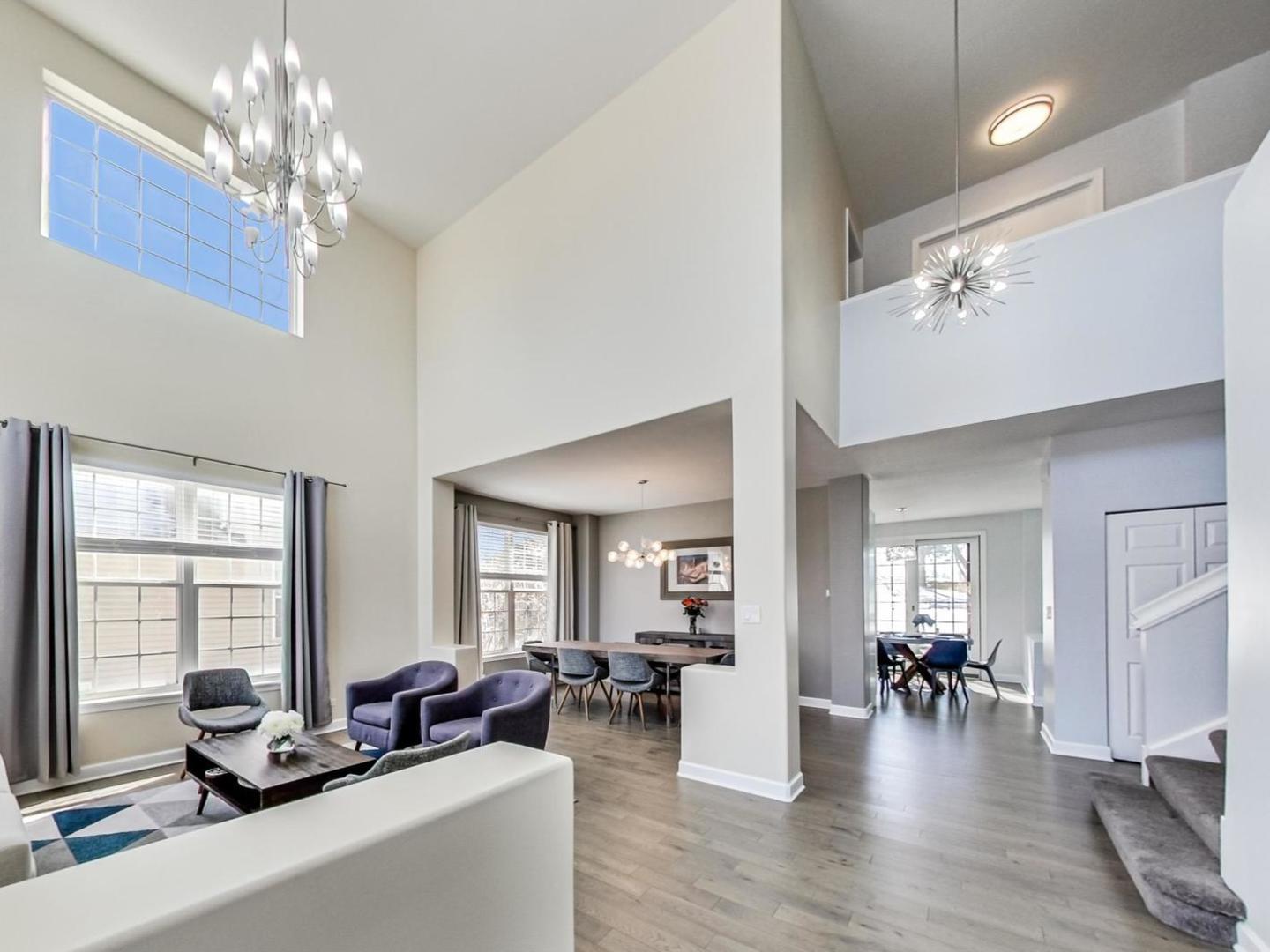 7311 Dada Drive Gurnee, IL 60031 - Photo 3 of 51 a living room with furniture and a chandelier