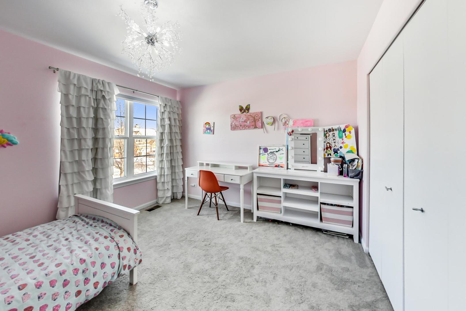 7311 Dada Drive Gurnee, IL 60031 - Photo 34 of 51 a bedroom with furniture and a window