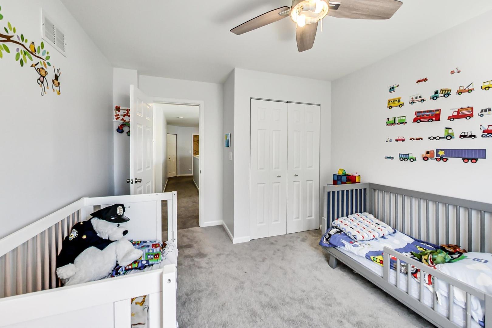 7311 Dada Drive Gurnee, IL 60031 - Photo 39 of 51 a bedroom with furniture and baby crib