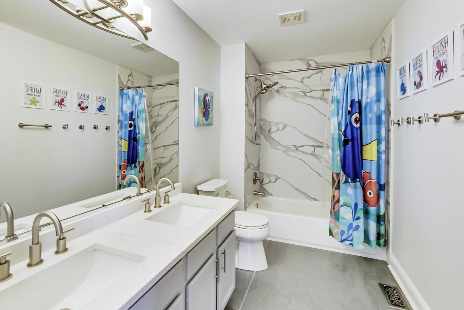 7311 Dada Drive Gurnee, IL 60031 - Photo 40 of 51 a bathroom with a sink toilet and shower