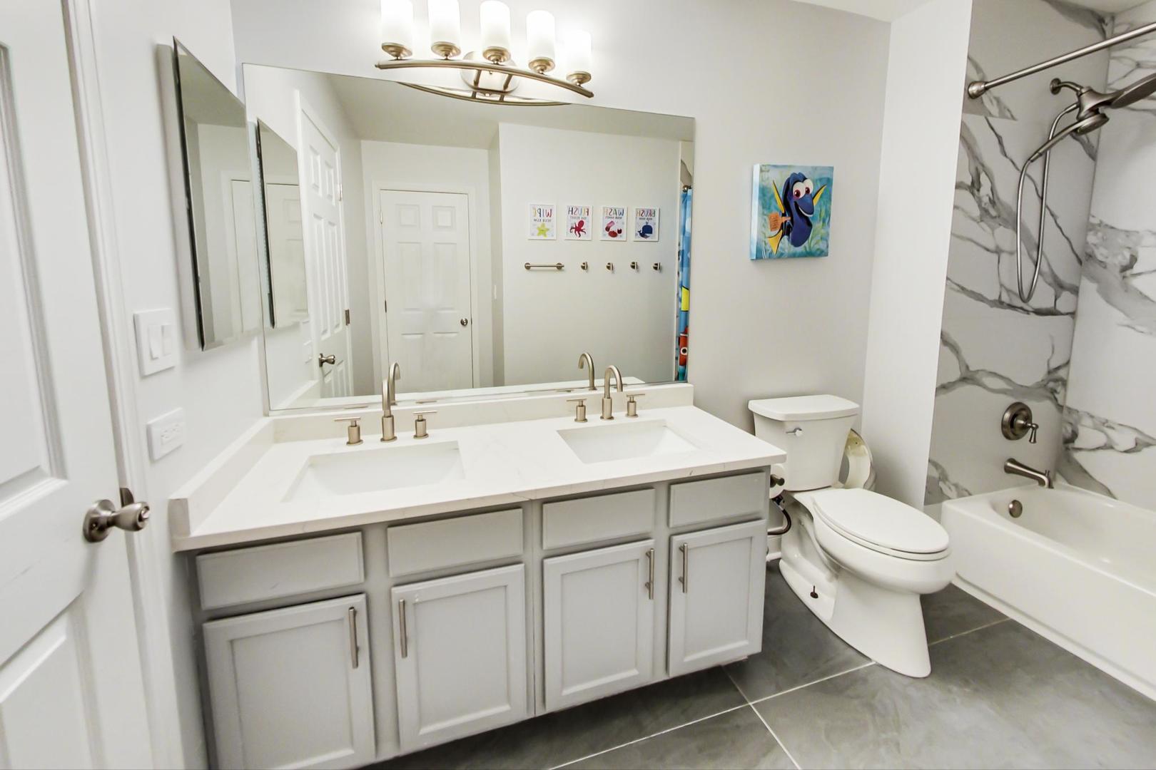 7311 Dada Drive Gurnee, IL 60031 - Photo 41 of 51 a bathroom with a sink toilet and shower