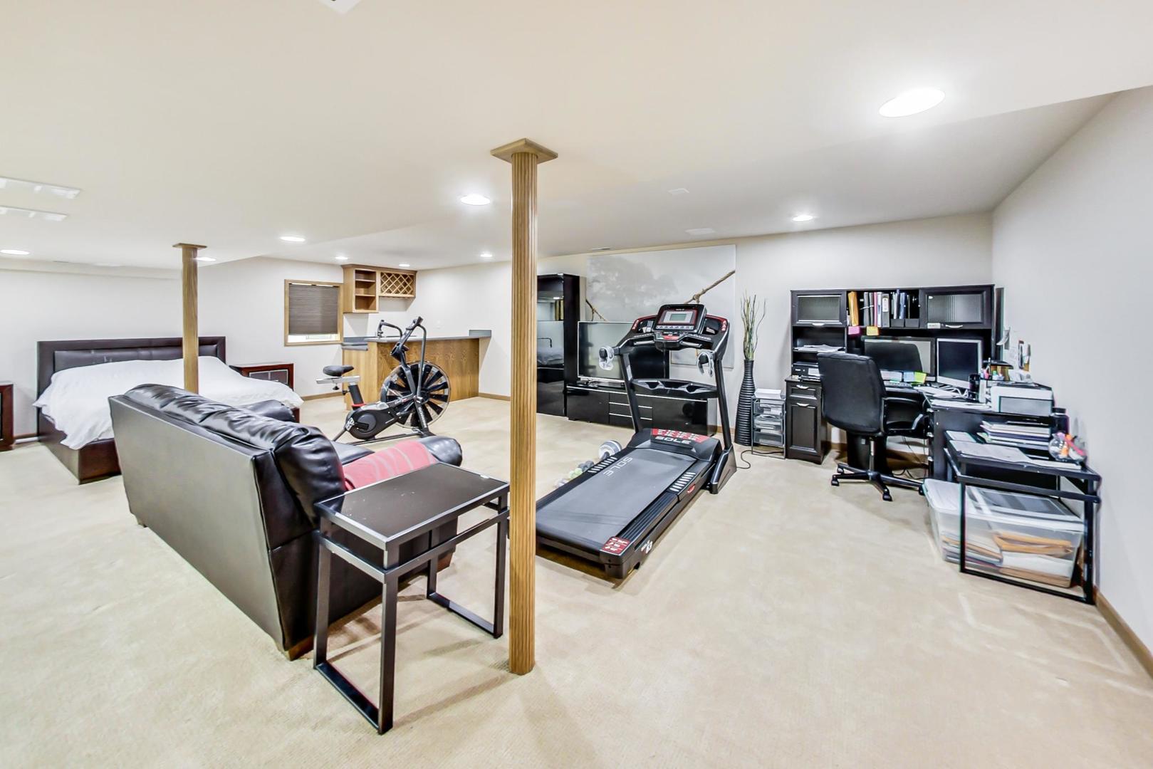 7311 Dada Drive Gurnee, IL 60031 - Photo 43 of 51 a living room with furniture gym equipment and a view of living room