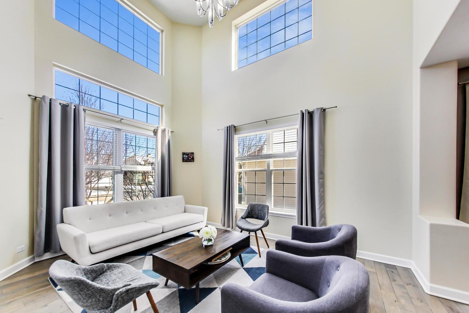 7311 Dada Drive Gurnee, IL 60031 - Photo 5 of 51 a living room with furniture and a large window