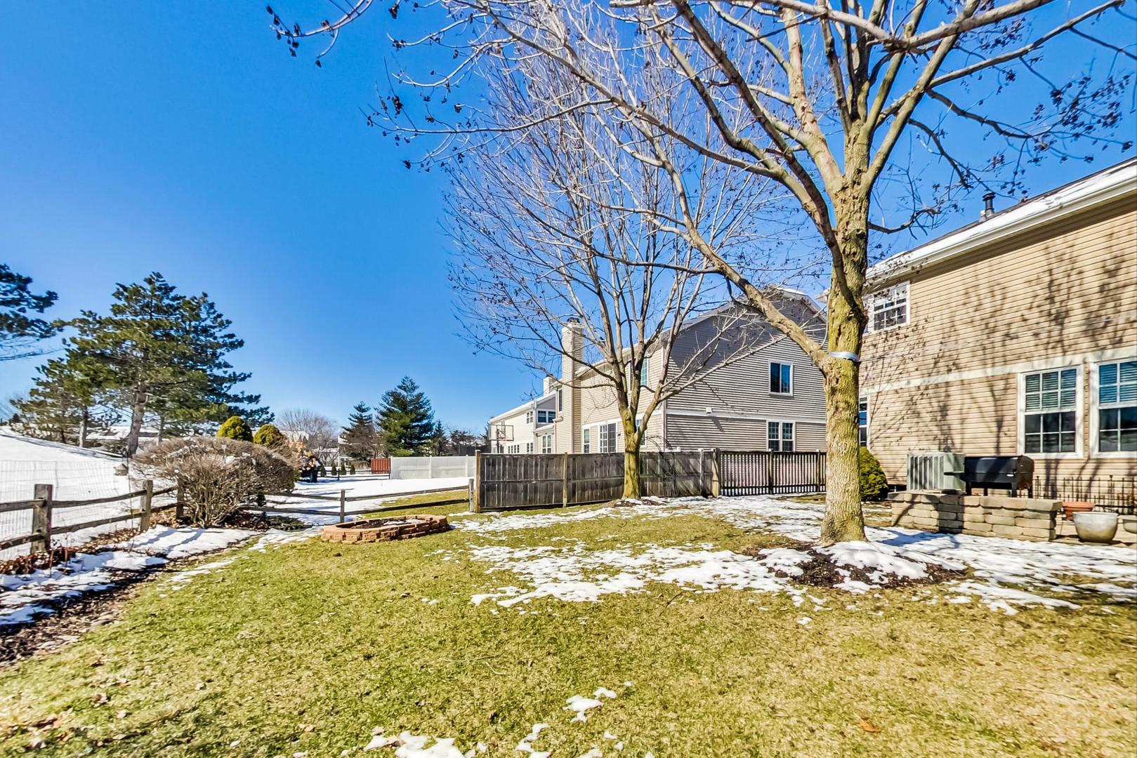 7311 Dada Drive Gurnee, IL 60031 - Photo 51 of 51 a view of a house with a yard covered with snow in the outdoor