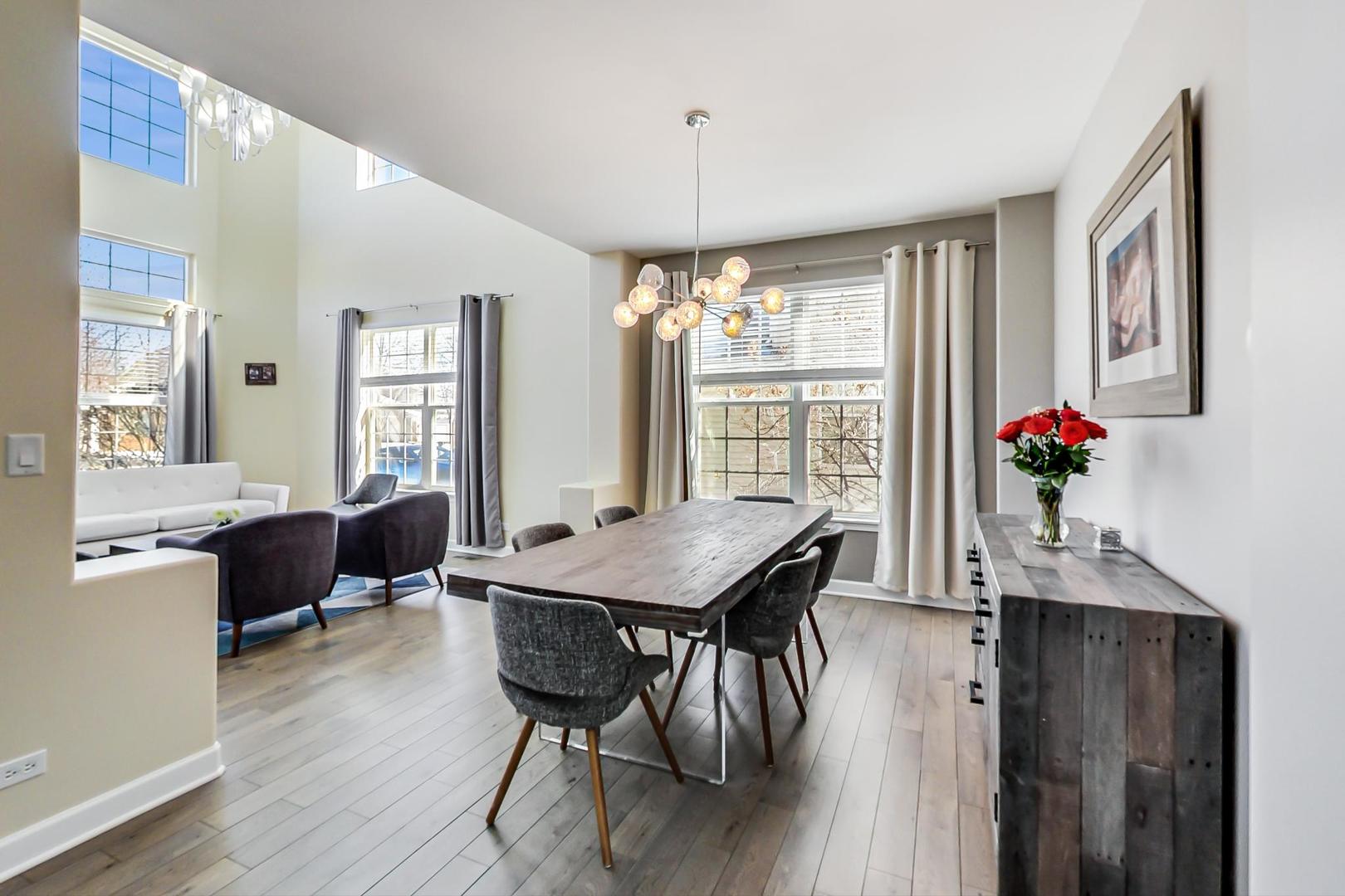 7311 Dada Drive Gurnee, IL 60031 - Photo 7 of 51 a dining room with furniture window wooden floor