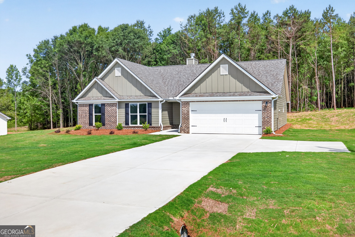 206 Airport Road, Unit 11 Canon, GA 30520 - Photo 2 of 34 a view of outdoor space yard and garage