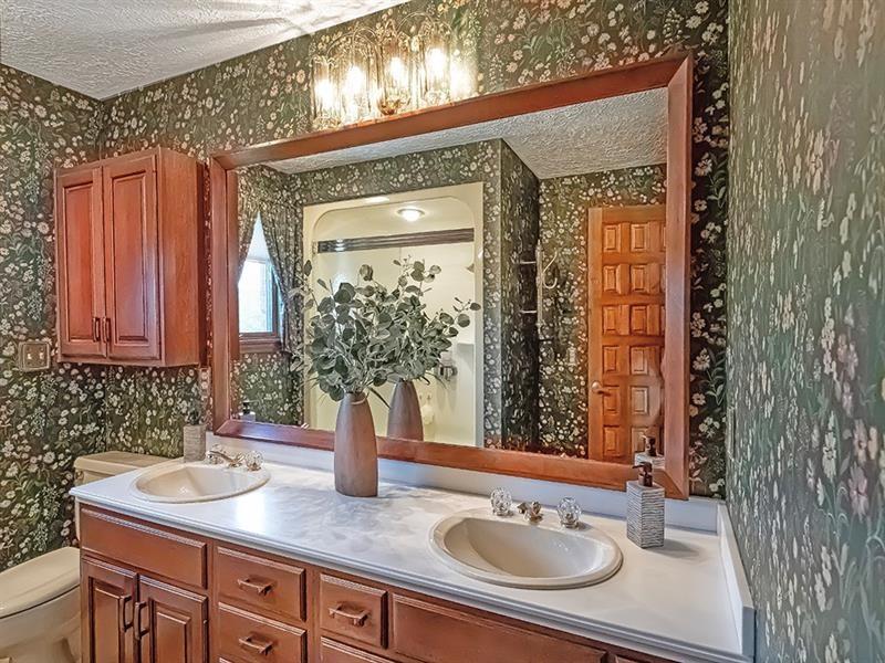 132 Ridge Drive Apollo, PA 15613 - Photo 13 of 37 a bathroom with a sink and a mirror