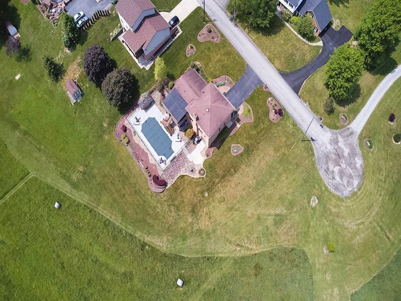 132 Ridge Drive Apollo, PA 15613 - Photo 17 of 37 an aerial view of residential house with outdoor space and swimming pool