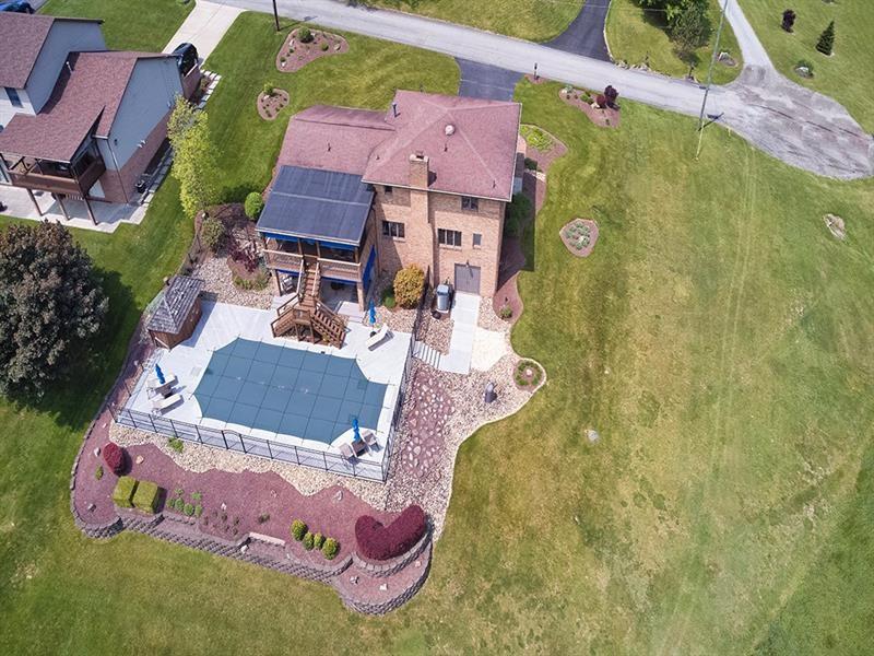 132 Ridge Drive Apollo, PA 15613 - Photo 18 of 37 an aerial view of residential house with outdoor space and parking