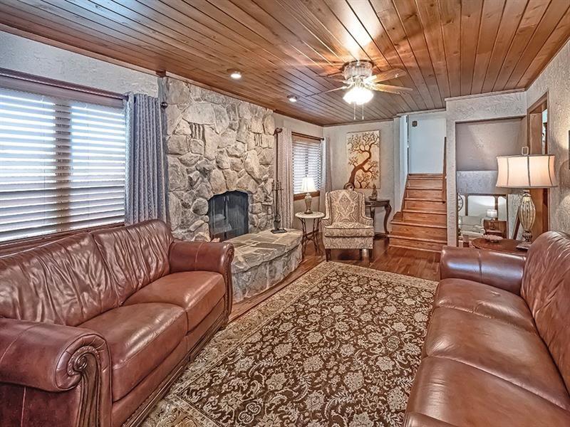 132 Ridge Drive Apollo, PA 15613 - Photo 19 of 37 a living room with furniture fireplace and a large window