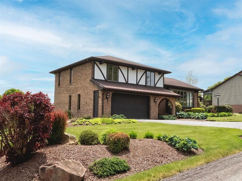 132 Ridge Drive Apollo, PA 15613 - Photo 2 of 37 a front view of a house with a yard