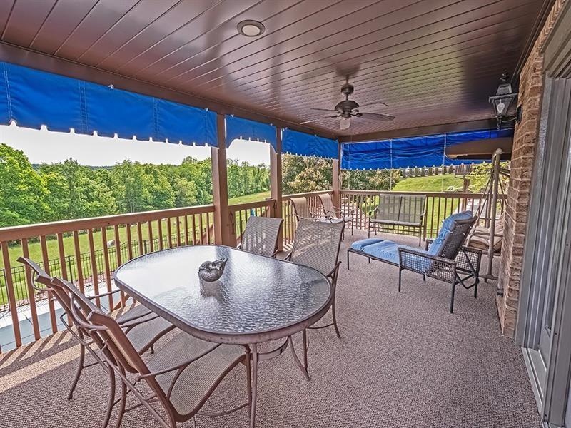 132 Ridge Drive Apollo, PA 15613 - Photo 31 of 37 a balcony with table and chairs