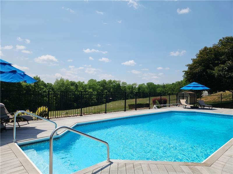132 Ridge Drive Apollo, PA 15613 - Photo 35 of 37 a view of a swimming pool with a chair and tables