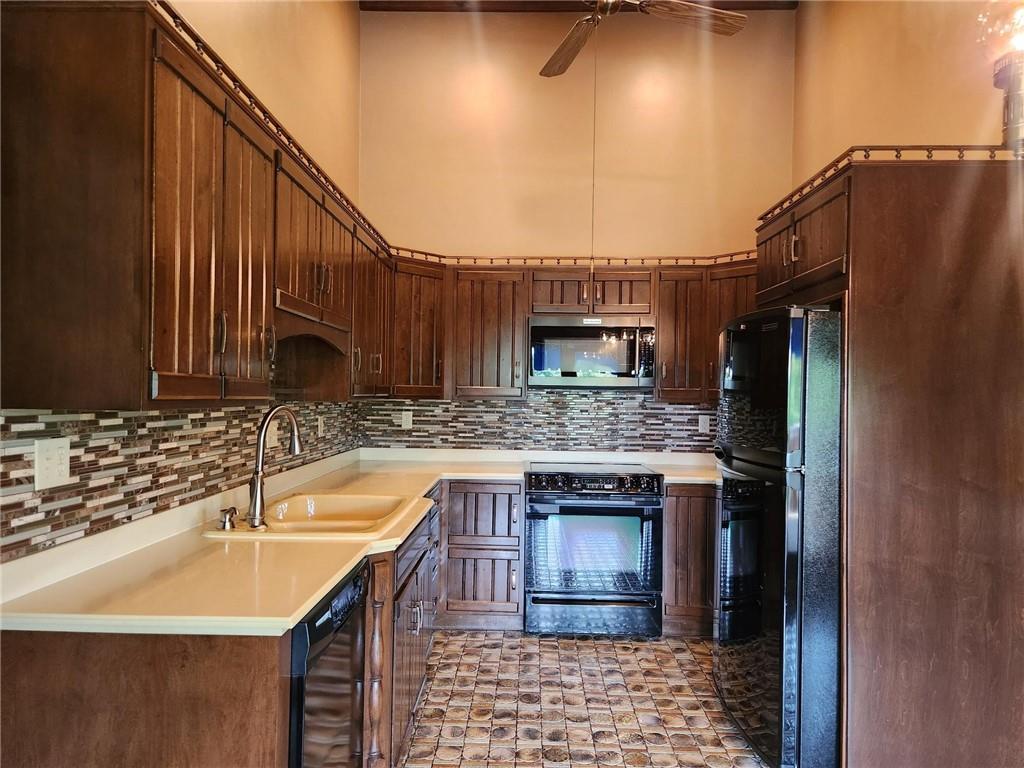 132 Ridge Drive Apollo, PA 15613 - Photo 6 of 37 a kitchen with stainless steel appliances granite countertop a sink and cabinets