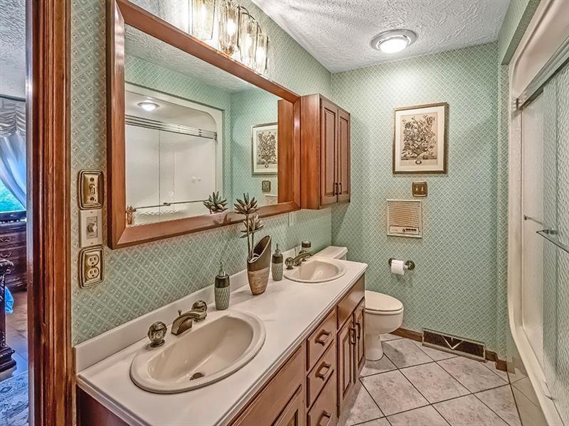 132 Ridge Drive Apollo, PA 15613 - Photo 9 of 37 a bathroom with a sink and a mirror