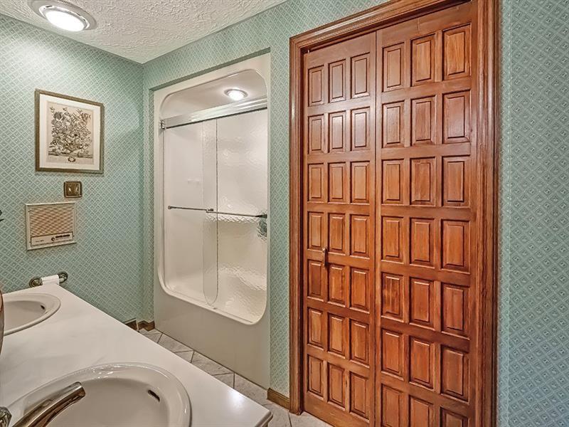 132 Ridge Drive Apollo, PA 15613 - Photo 10 of 37 a bathroom with a granite countertop shower and a sink