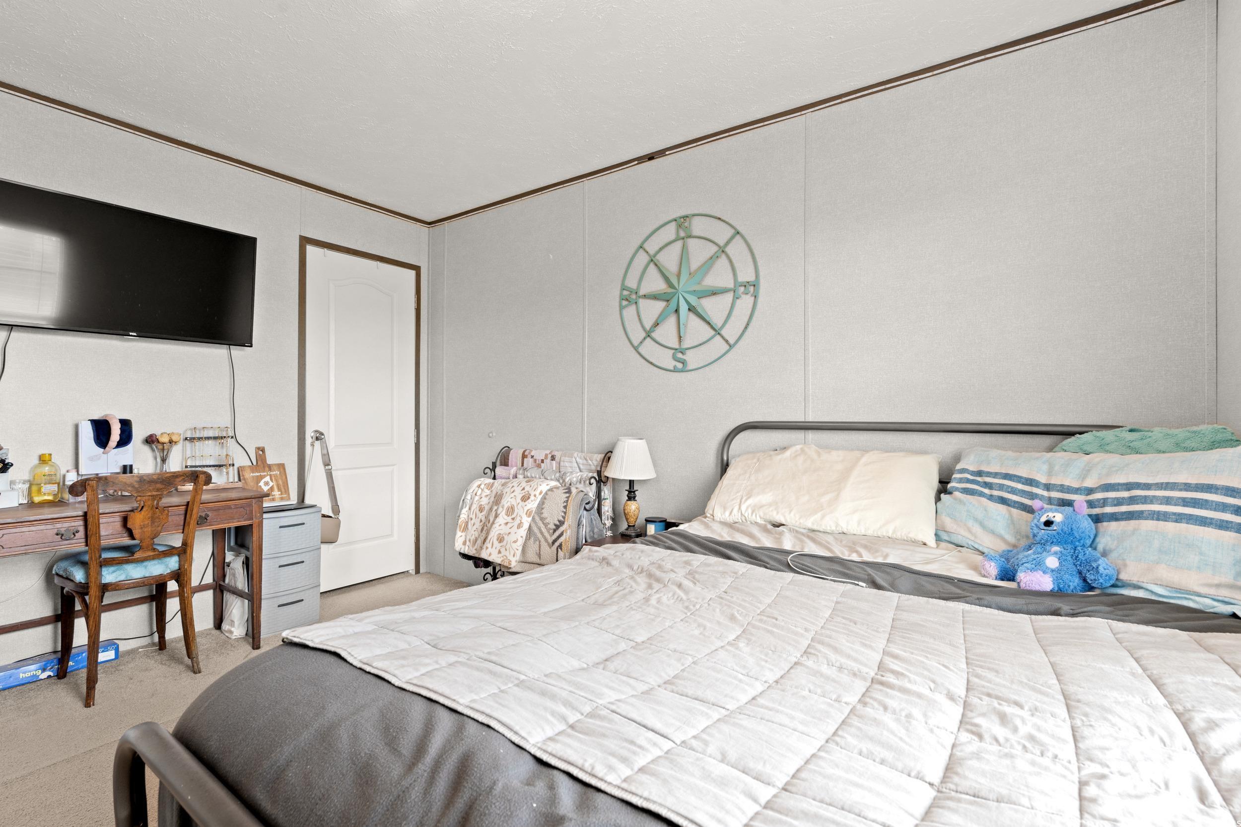 1217 Poplar Creek Road Lake View, SC 29563 - Photo 18 of 38 Bedroom with carpet, ornamental molding, and a desk