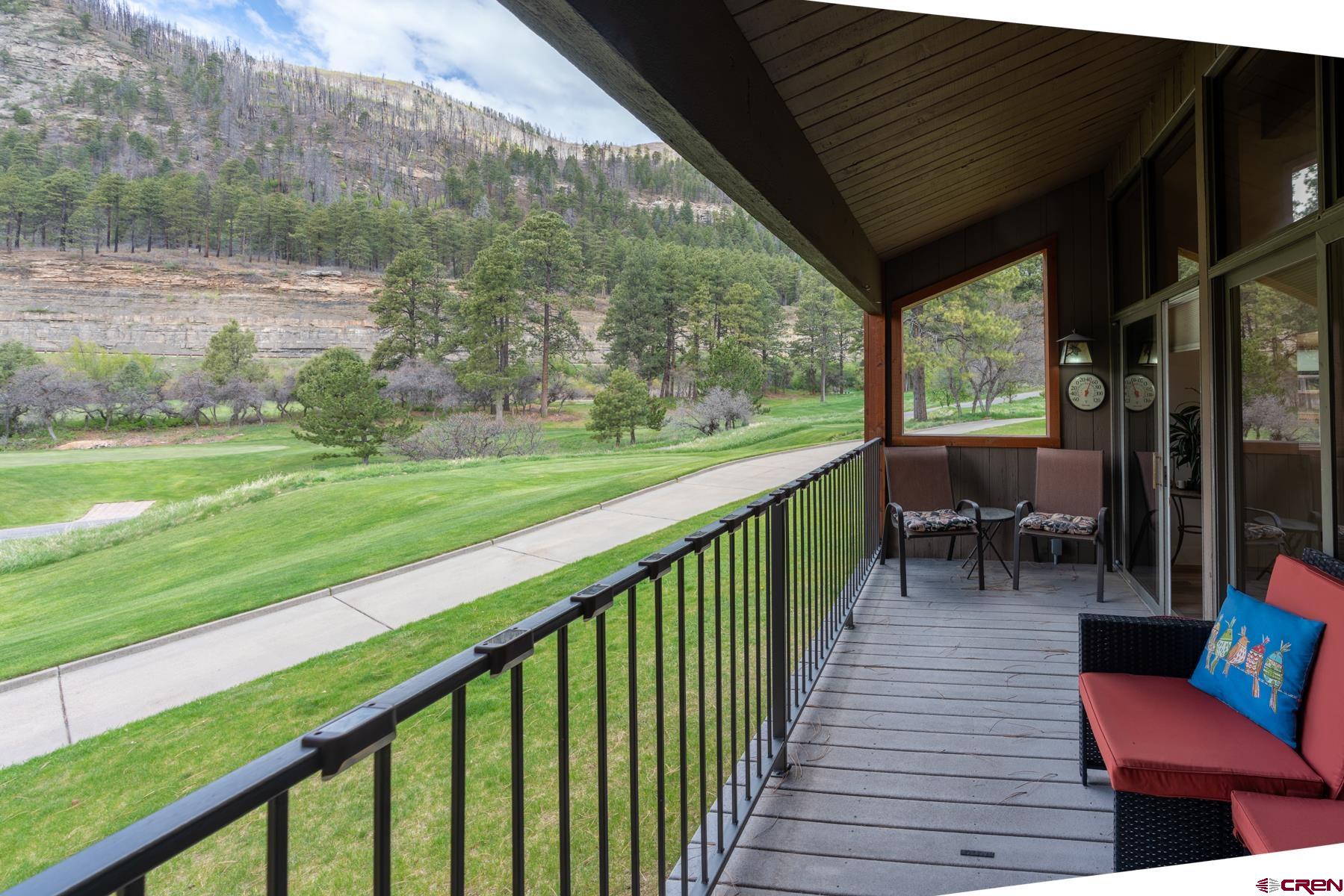 73 Tamarron Drive, Unit 866 Durango, CO 81301 - Photo 22 of 34 a view of a two chairs in the deck