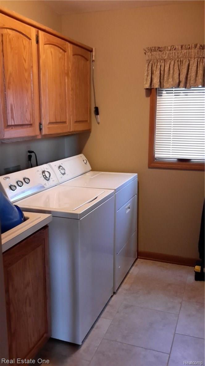 8625 35 Mile Road Romeo, MI 48065 - Photo 14 of 46 Laundry room with ceramic tile
