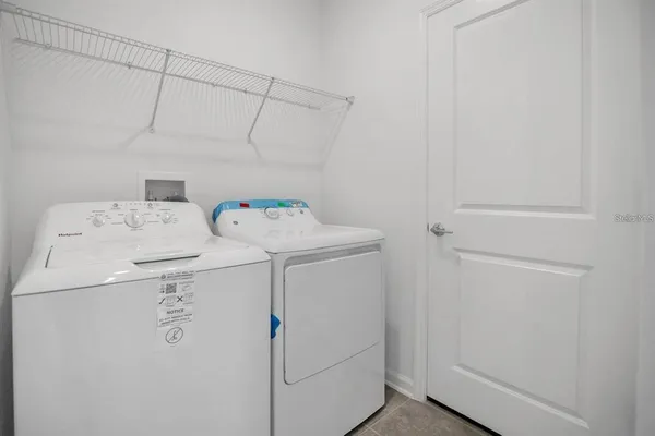 a view of workspace with cabinet